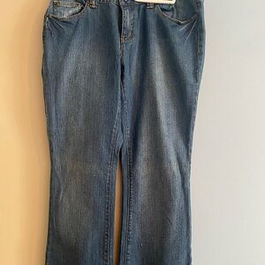 Michael Kors bootleg jeans. Medium wash with detailing on back pockets.